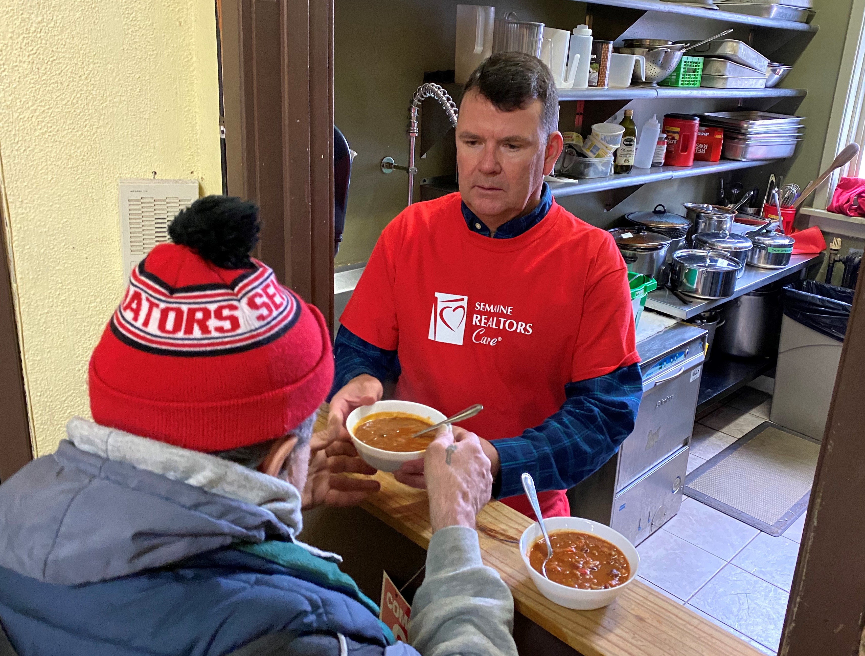 CREA CEO helps serve chili lunch at Centre 507