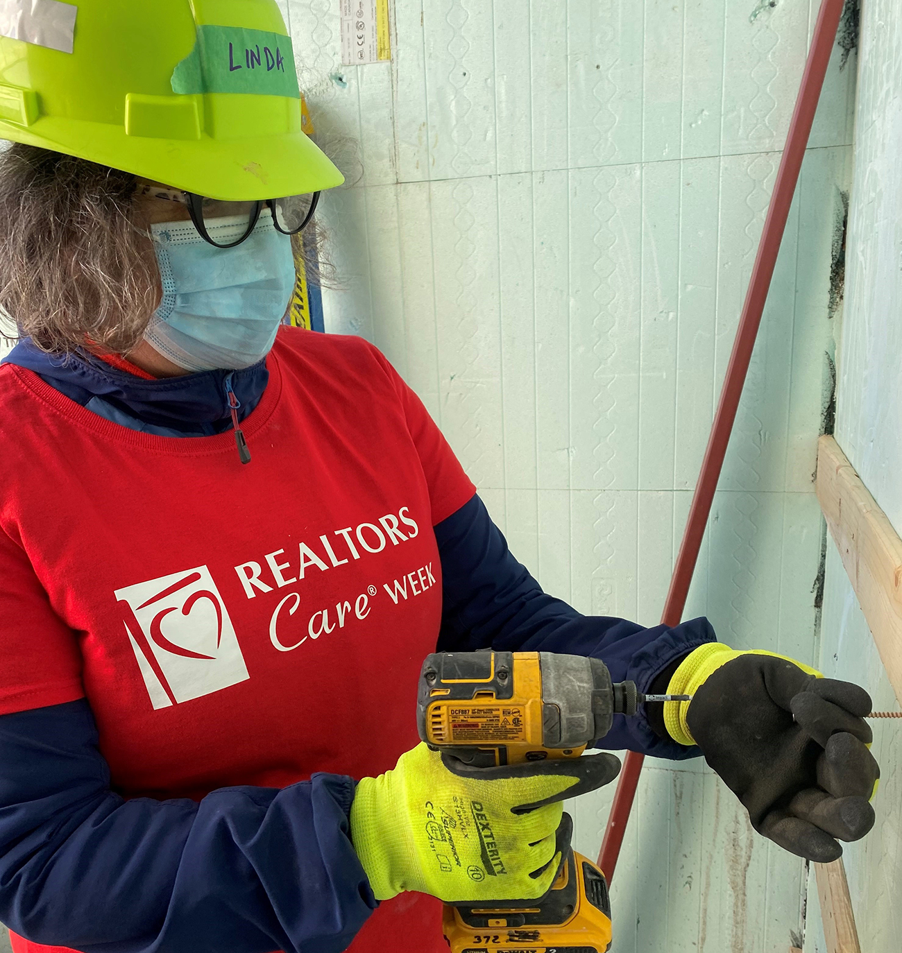 CREA staff volunteer at Habitat for Humanity. 